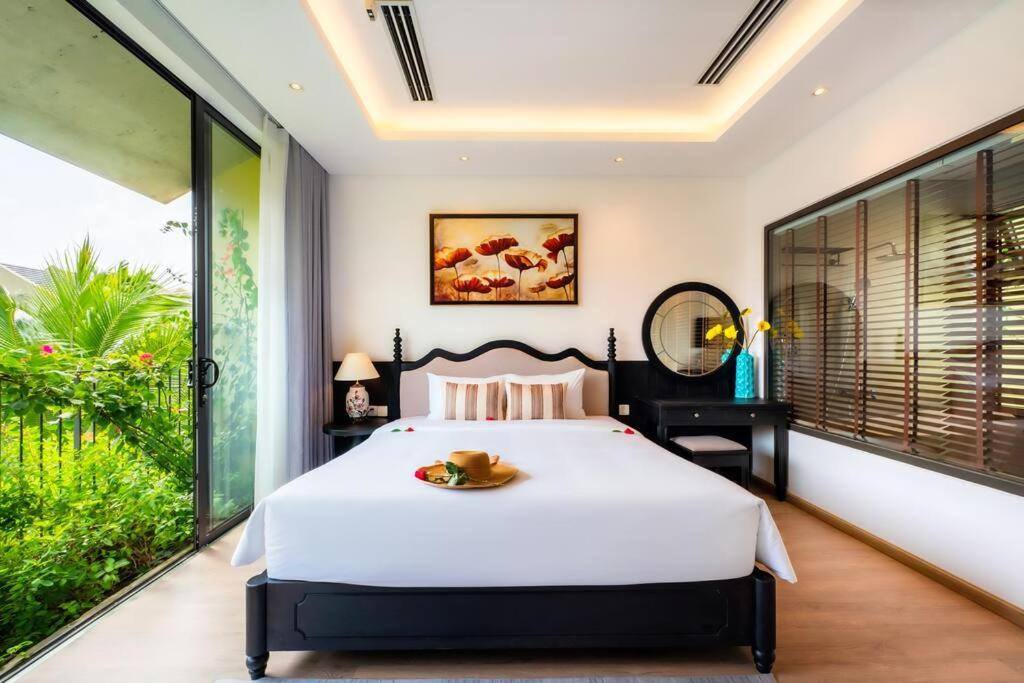 Phòng ngủ biệt thự Casamia Hội An thực tế